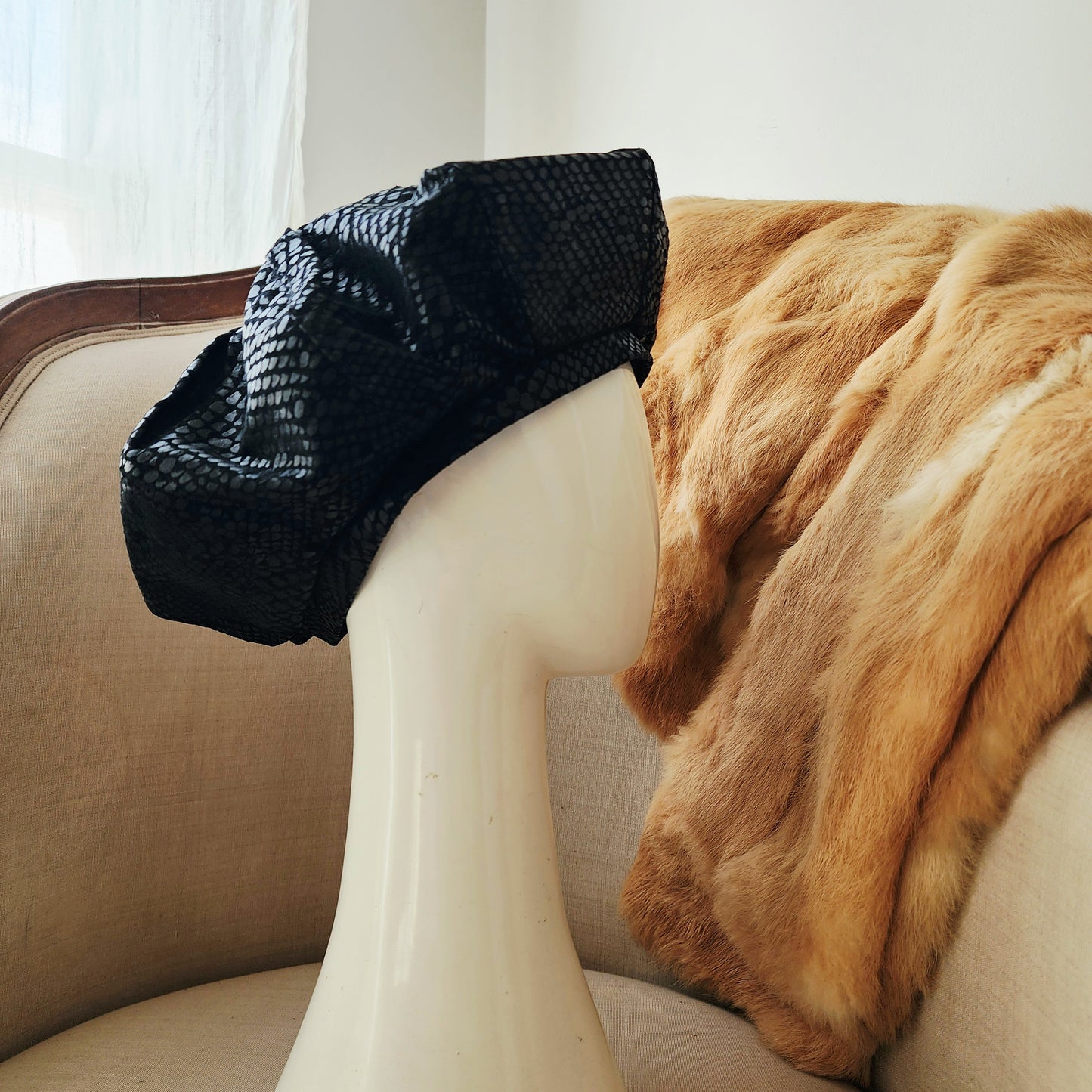 Vintage serpent-print suede beret with structured oversized silhouette.