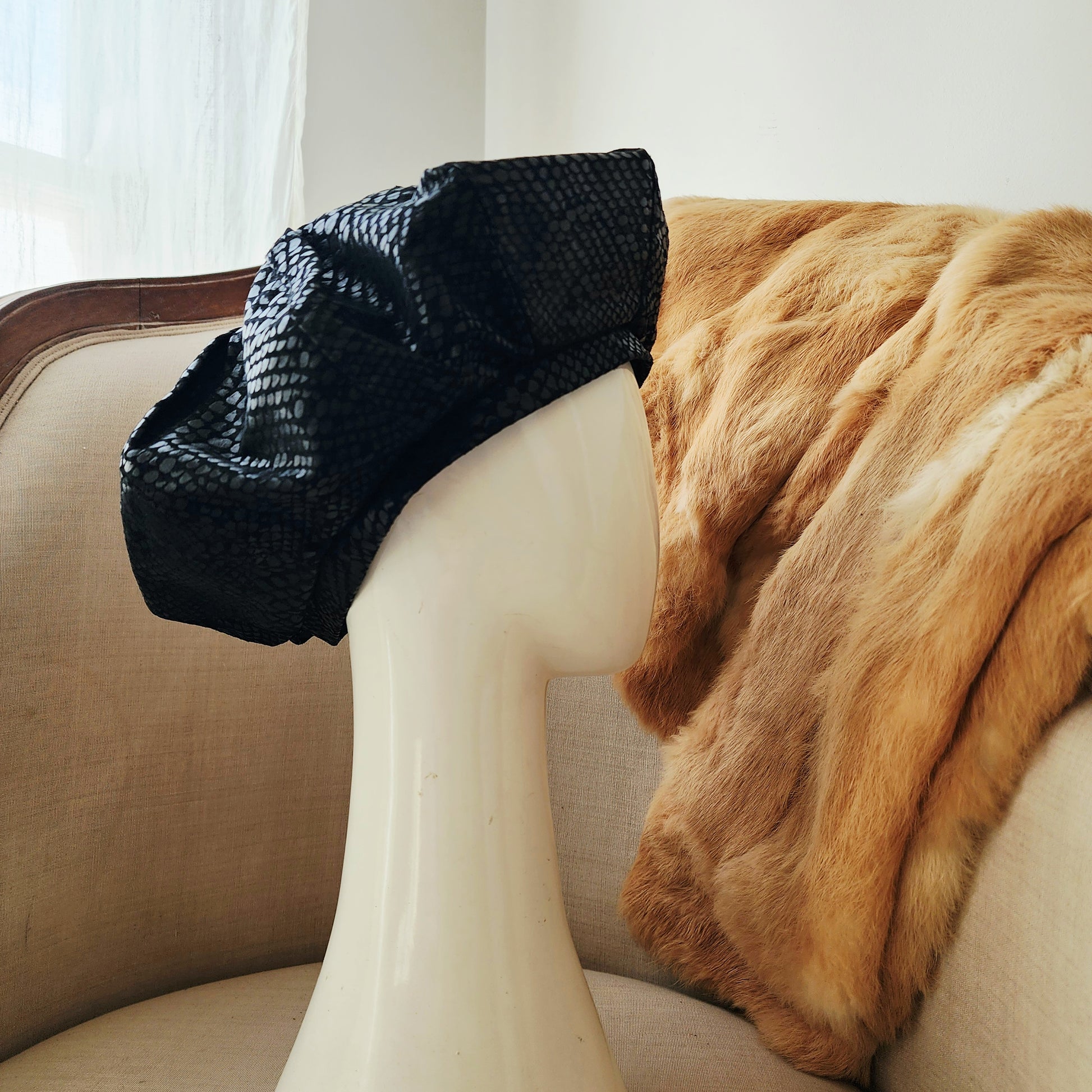 Vintage serpent-print suede beret with structured oversized silhouette.