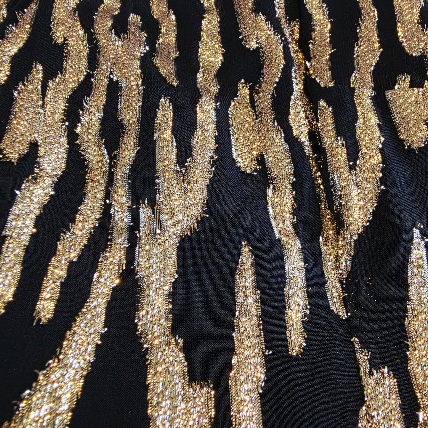 Close up of the metallic fabric on the Vintage Zebra Metallic Mini Dress