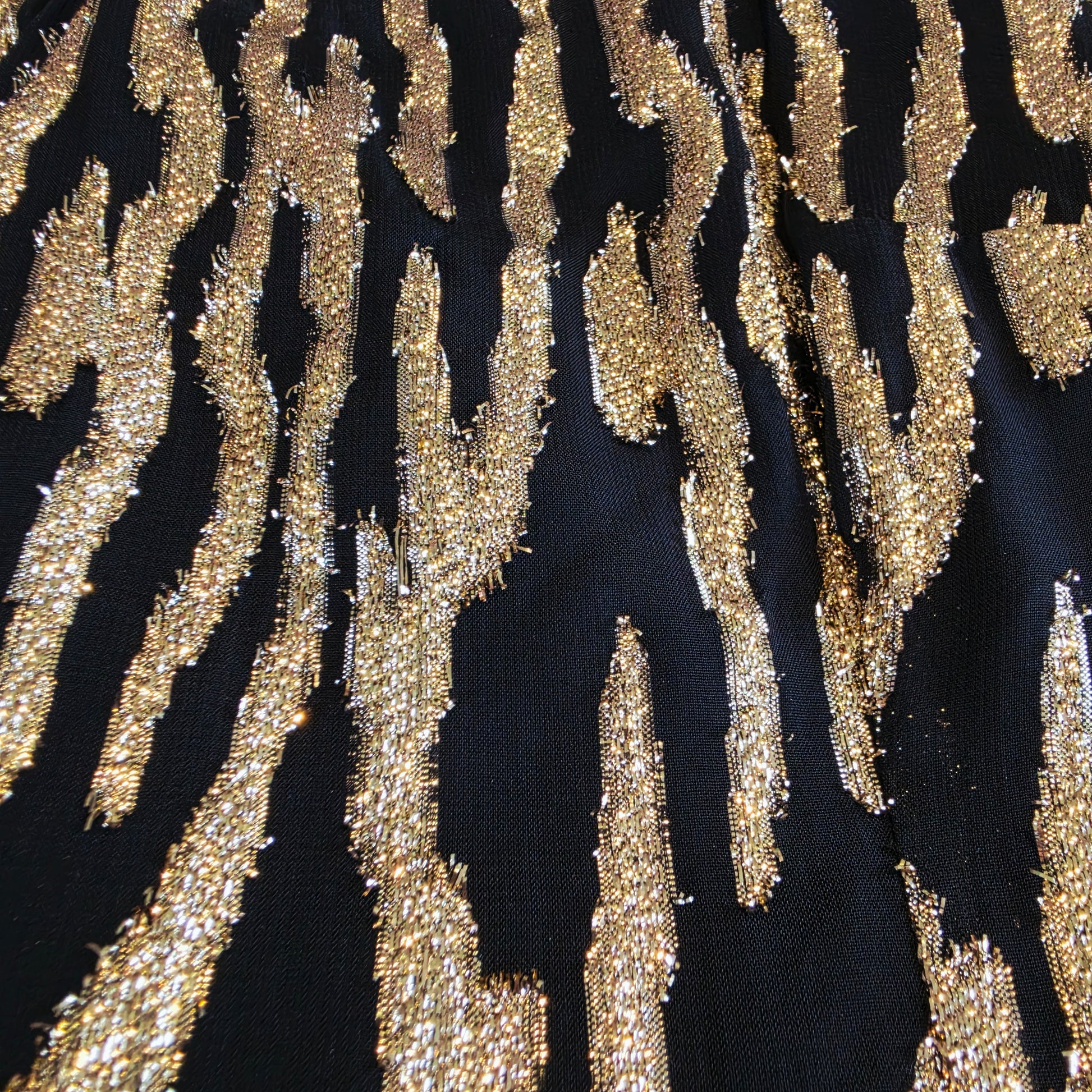 Close up of the metallic fabric on the Vintage Zebra Metallic Mini Dress