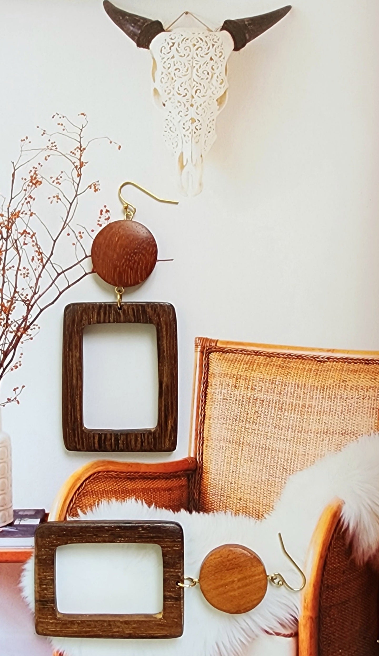 Flat lay view of the Daisy Mae retro handmade wooden earrings.
