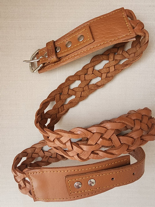 Tan leather braided belt, with silver hard wear.