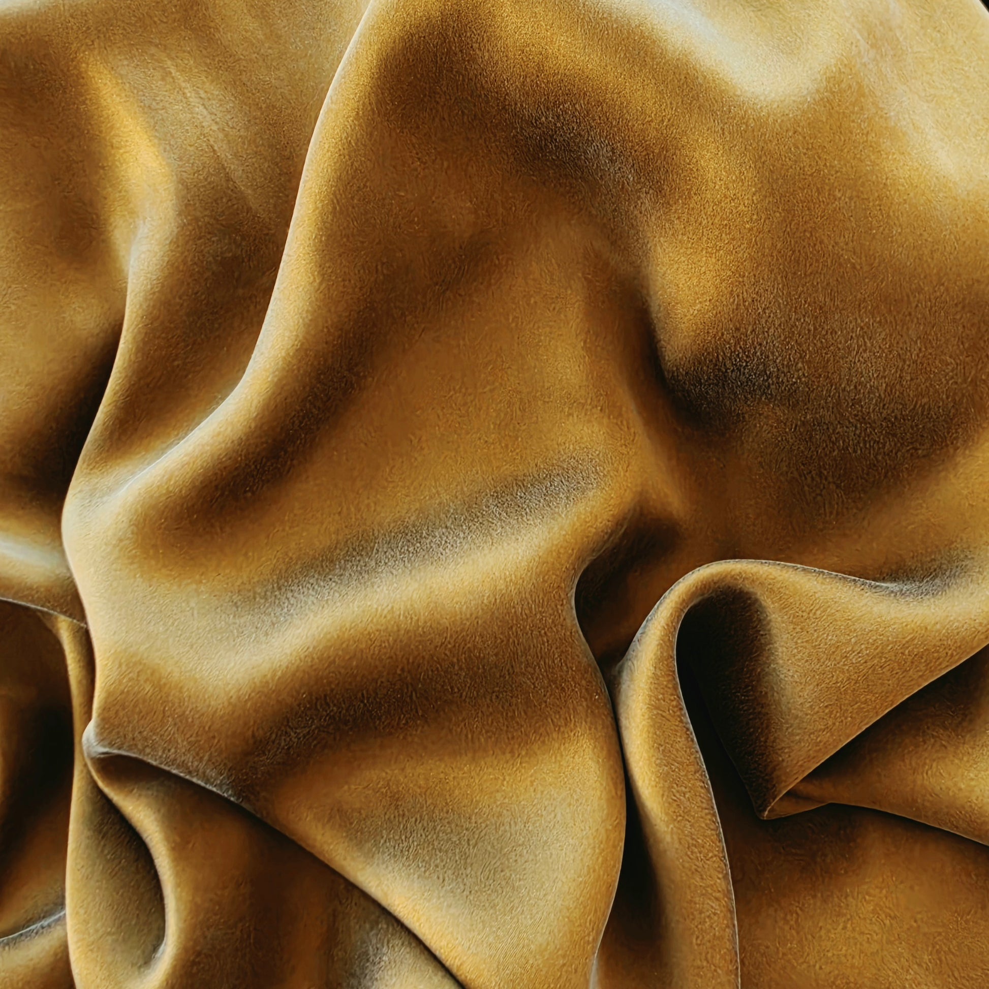 Close-up of the gold silk fabric on the Zimmermann silk wrap midi dress, showing soft folds and a subtle sheen.